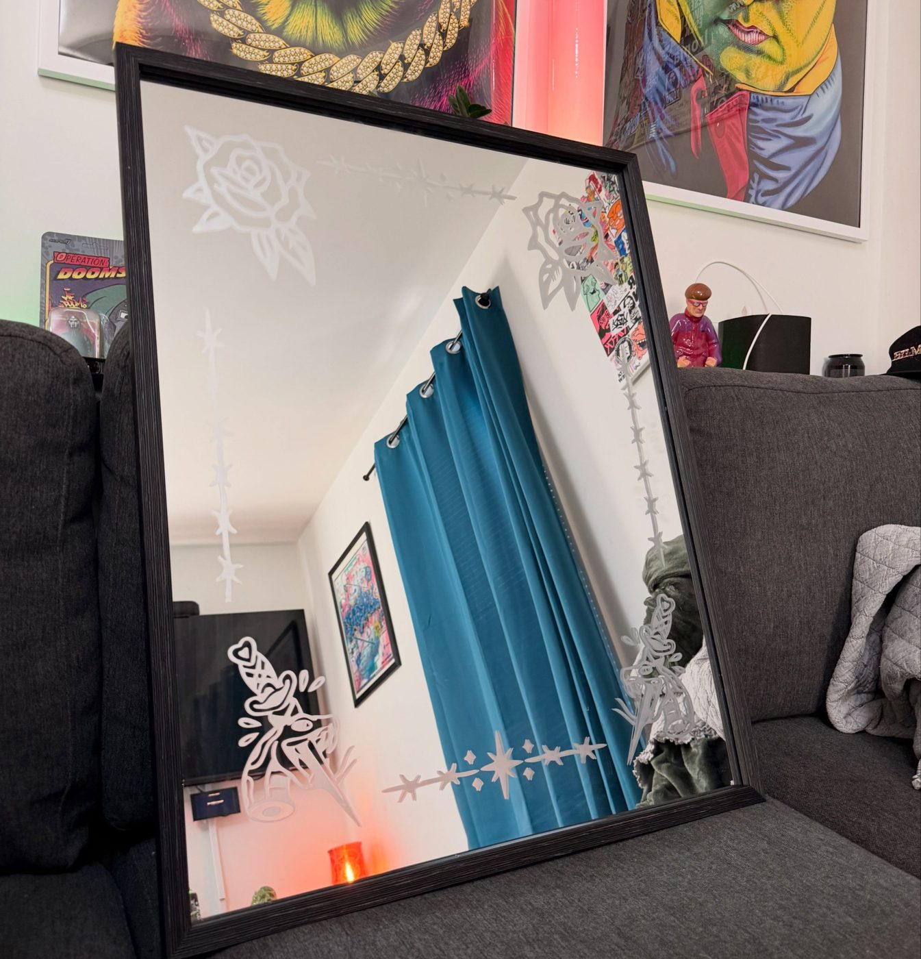 Large framed mirror etched with roses, barbed wire and daggers
